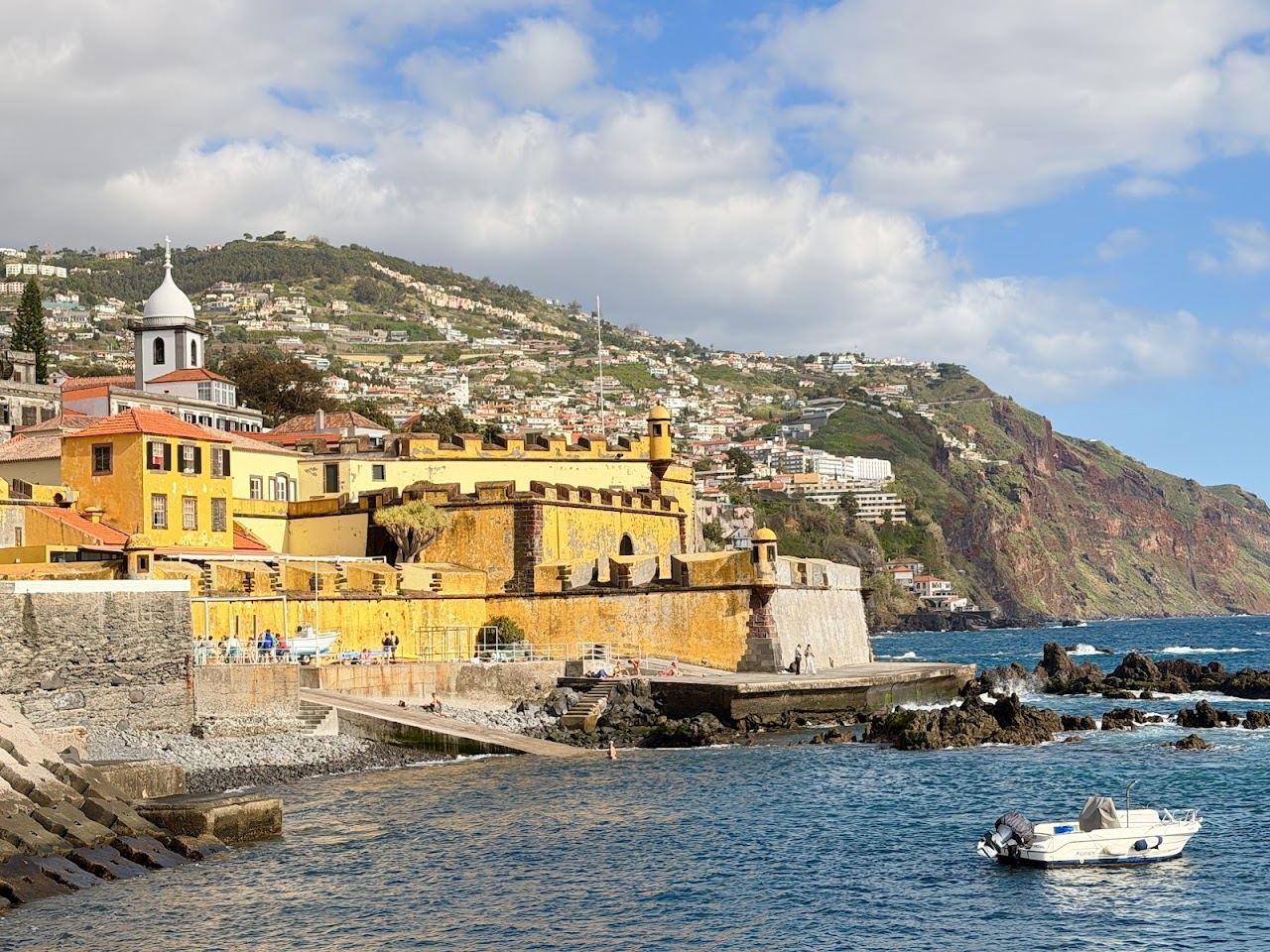 The yellow walls of Sao Tiago Fort on the Funchal seafront beside the Barreirinha complex