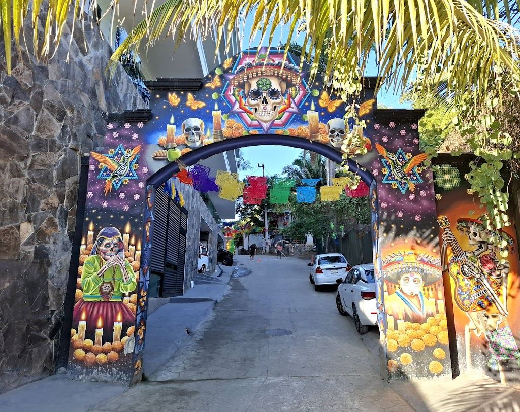 Colourful painted graves in the Sayulita town cemetery on the path to Playa de los Muertos