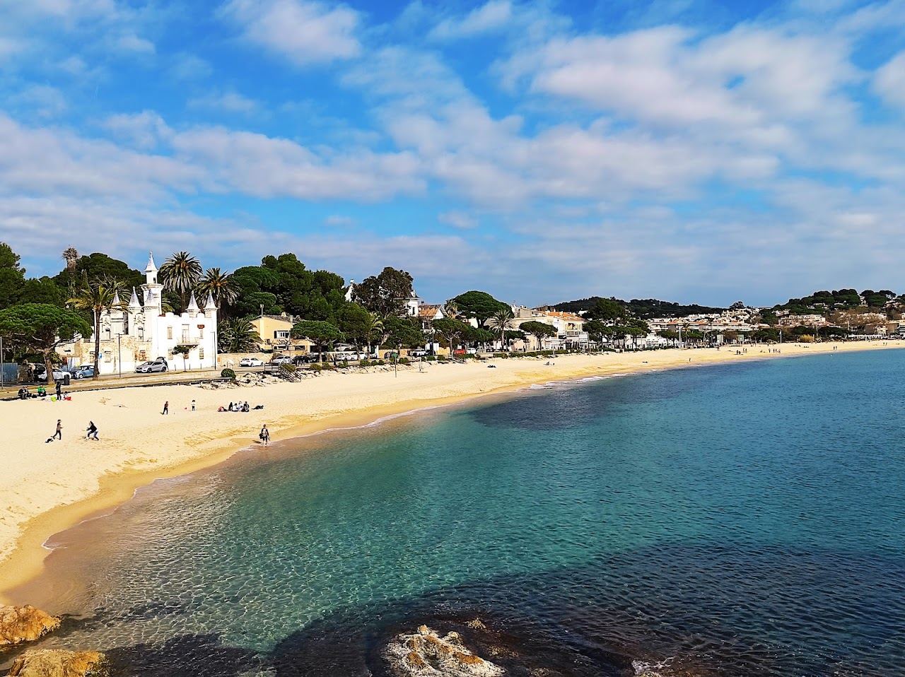 The sheltered curve of the Bay of Sant Pol at S'Agaro seen from the water's edge
