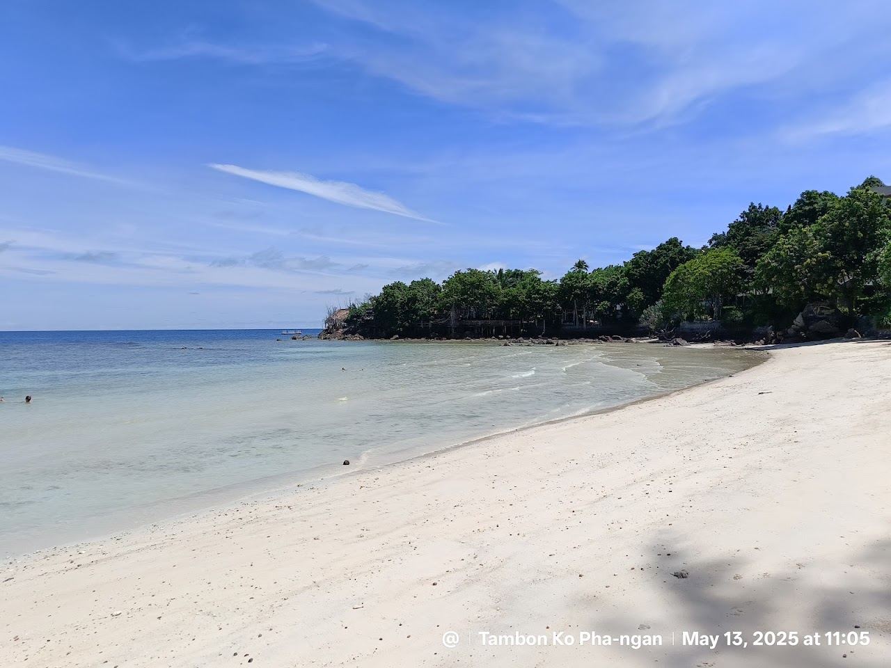 Clear water and rocks framing the small Haad Son cove on the west coast of Koh Phangan