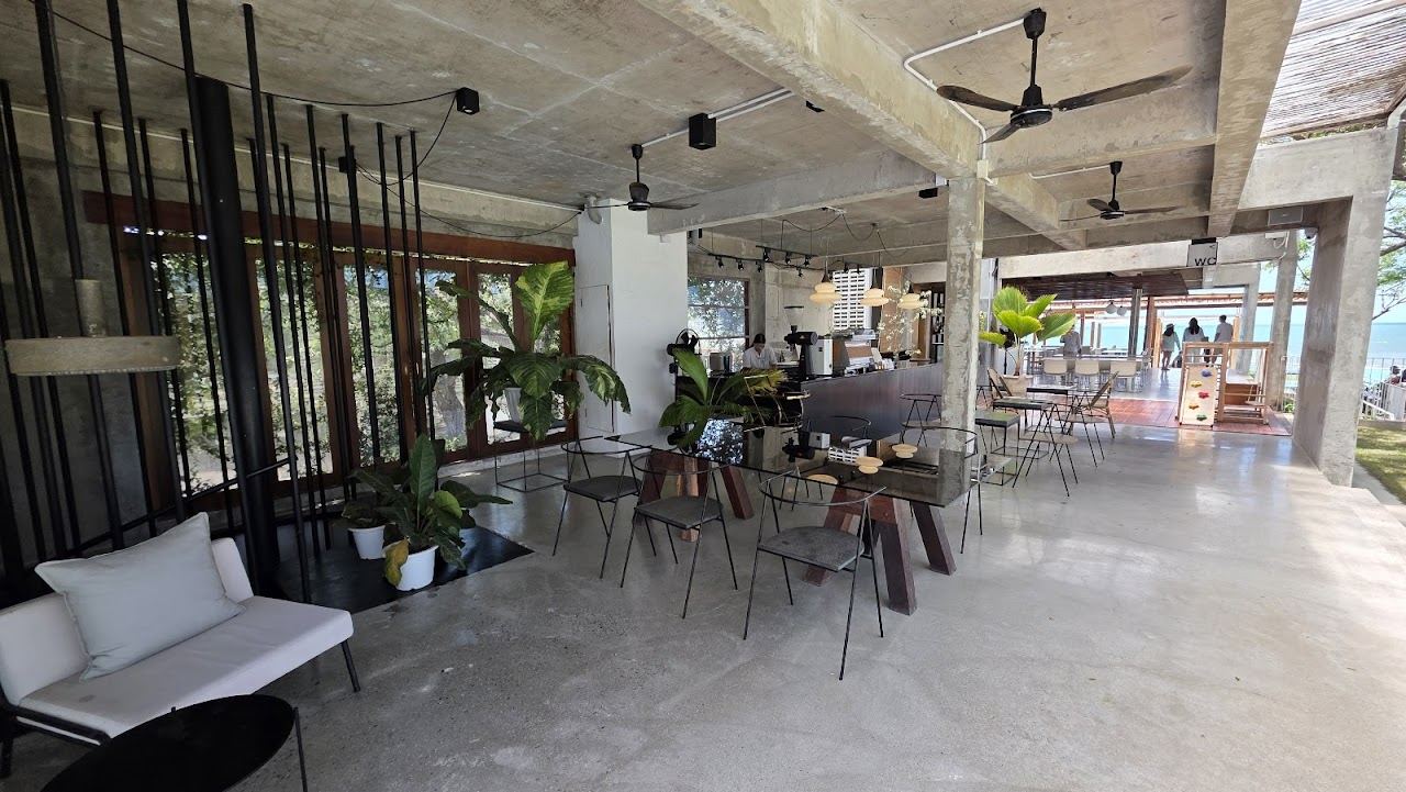 A beachfront deck and pool on the sand at the Seenspace complex on Hua Hin Beach