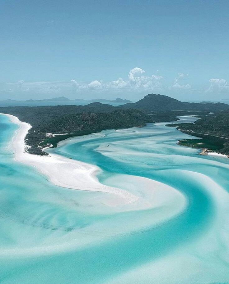 The swirling silica sand and turquoise water of Whitehaven Beach in the Whitsundays