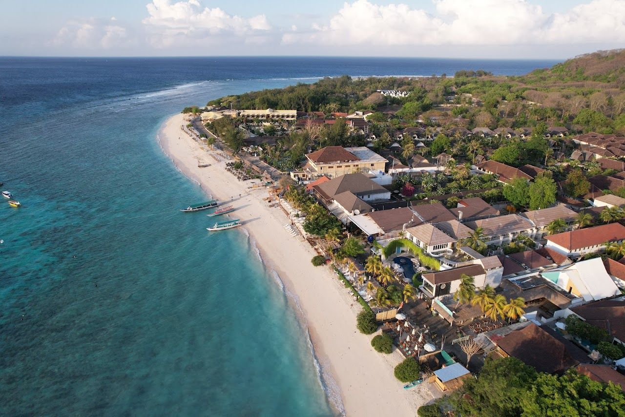 Palm backed sand and clear water on Gili Trawangan, Indonesia
