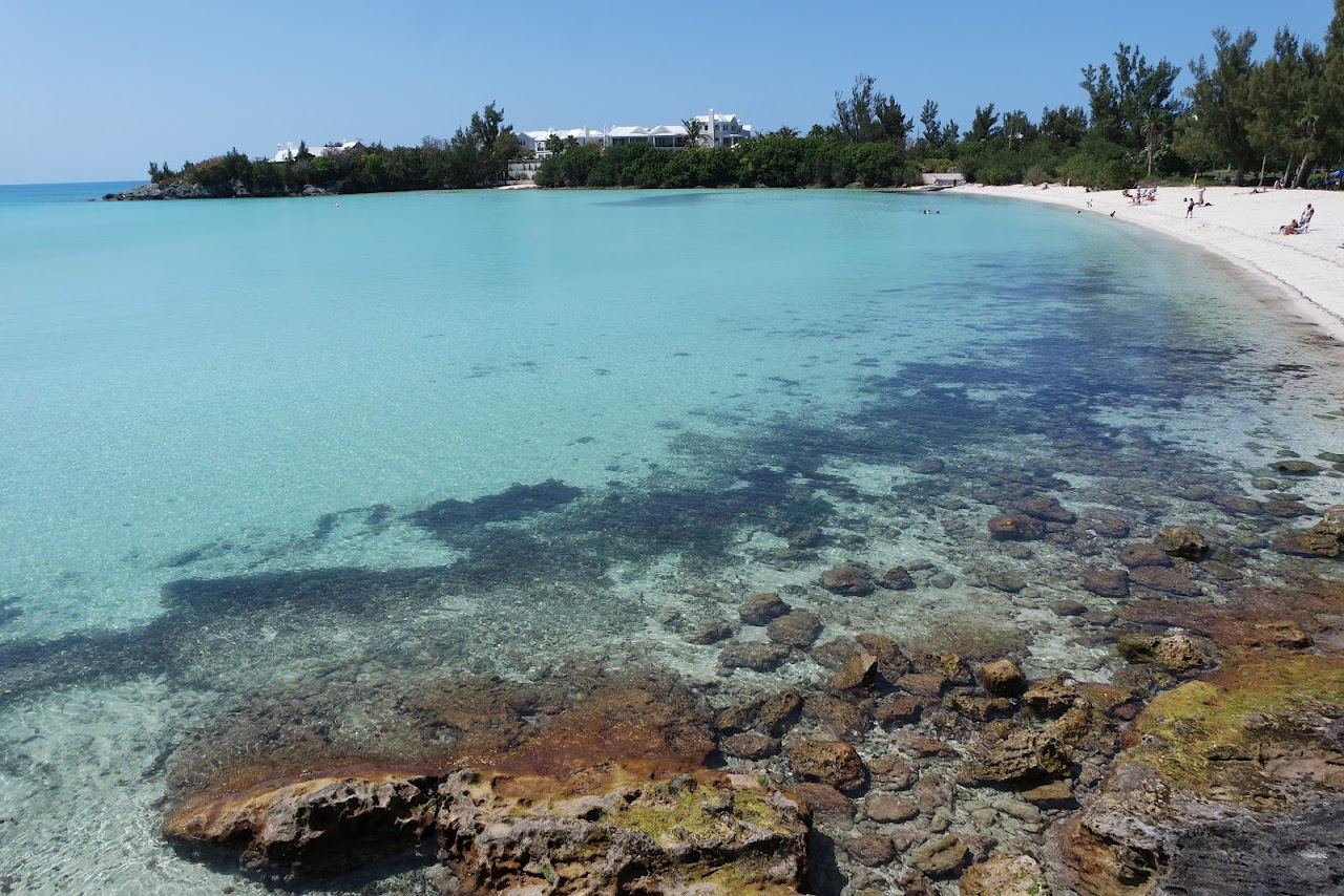 The pale sand and shallow calm water of Shelly Bay on the North Shore of Bermuda