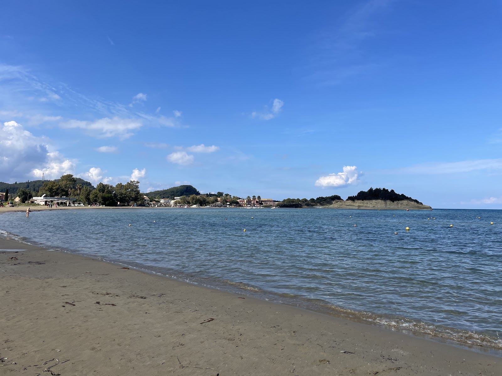 Sandy main beach and sculpted sandstone cliffs at Sidari on the north coast of Corfu