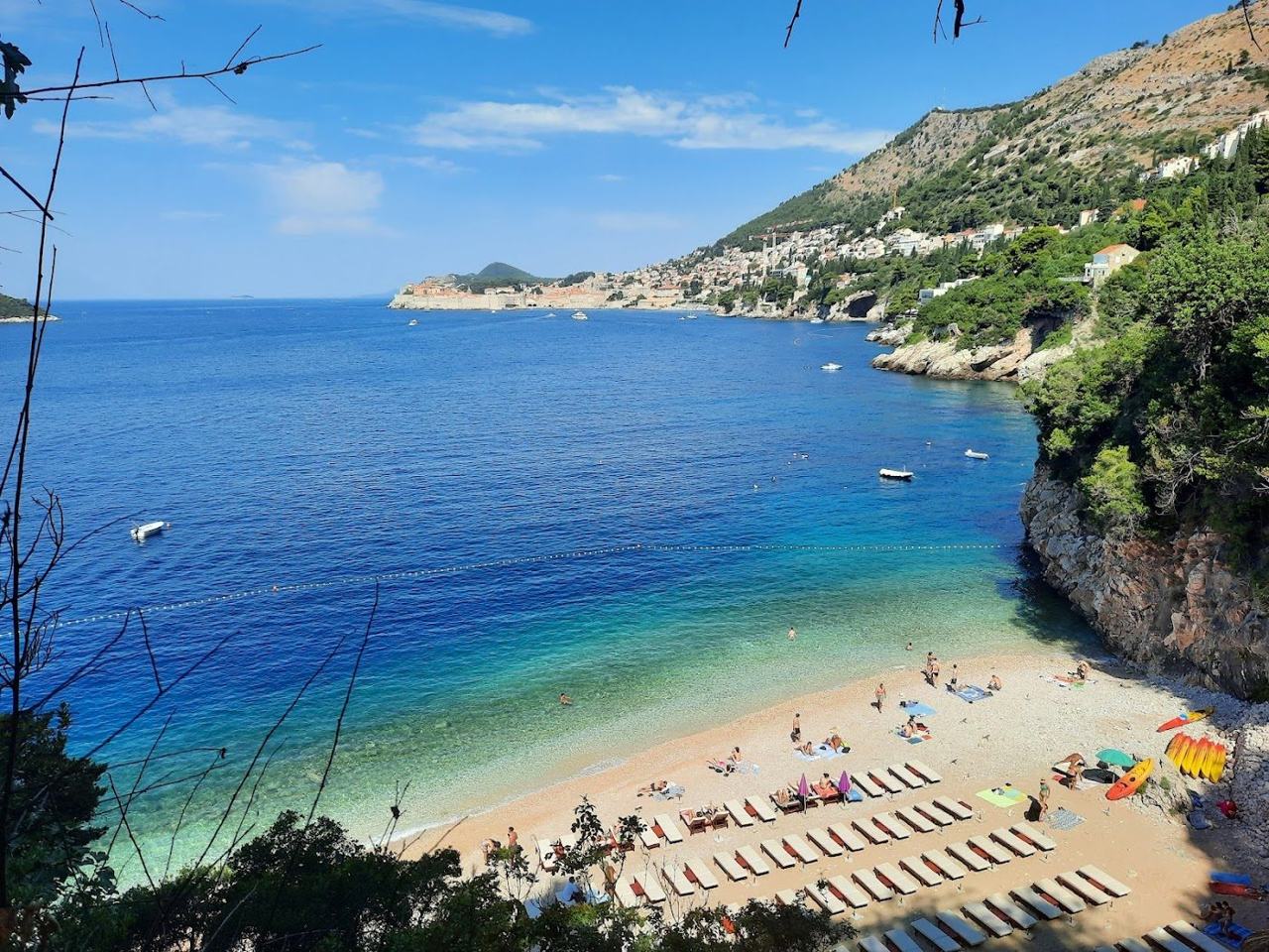 Sveti Jakov pebble cove with Old Town views in Dubrovnik on the Dalmatian Coast