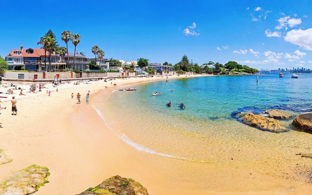 The small golden pocket beach and calm clear water of Camp Cove near Watsons Bay in Sydney