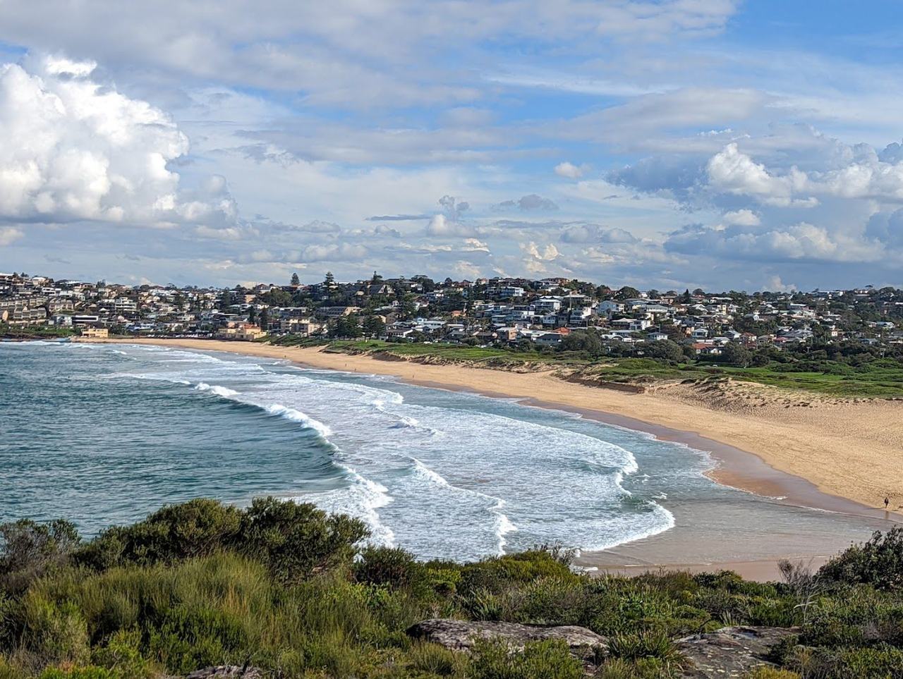 The long open surf beach at Curl Curl in Sydney