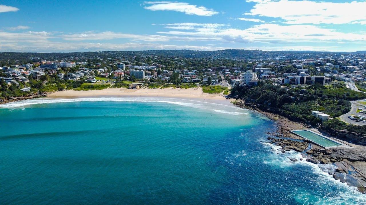 The sheltered cove and headlands of Freshwater Beach in Sydney
