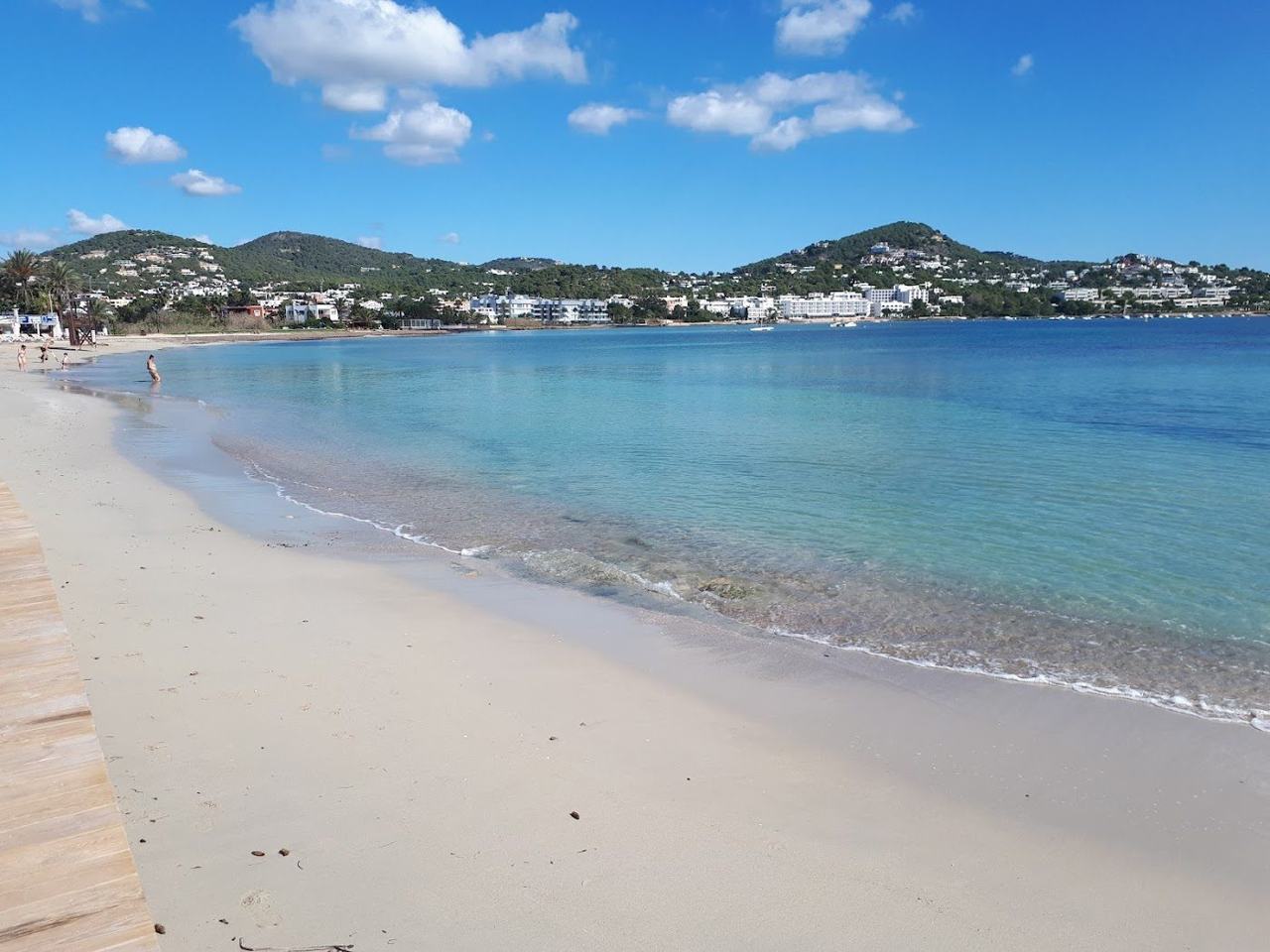 The calm sheltered bay and shallow water of Talamanca Beach near Ibiza Town