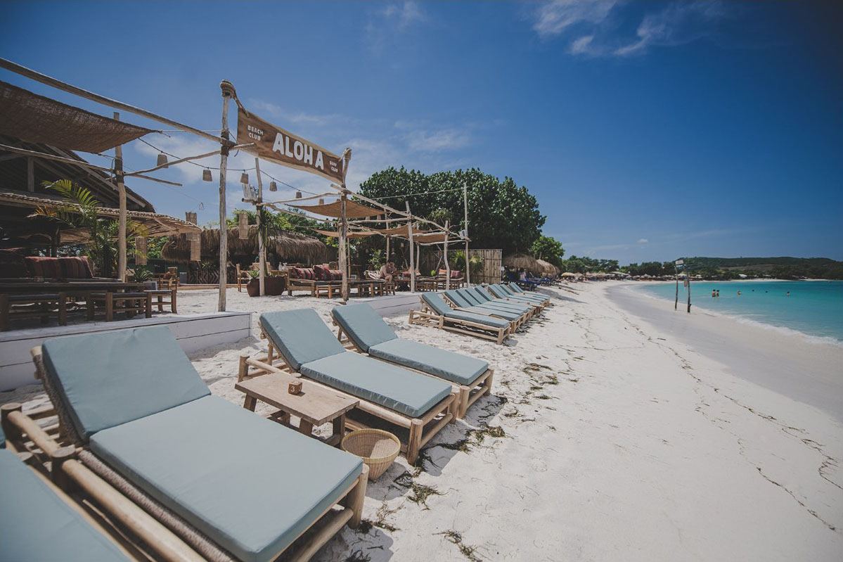 Beachfront daybeds at Aloha Beach Club on nearby Tanjung Aan in Lombok