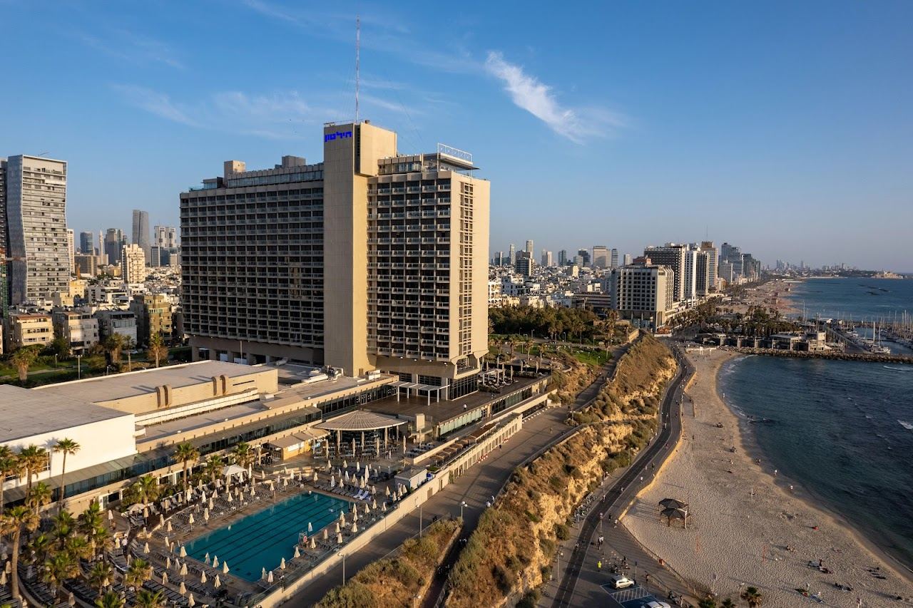 Rocky shore and Mediterranean water at Hilton beach in Tel Aviv