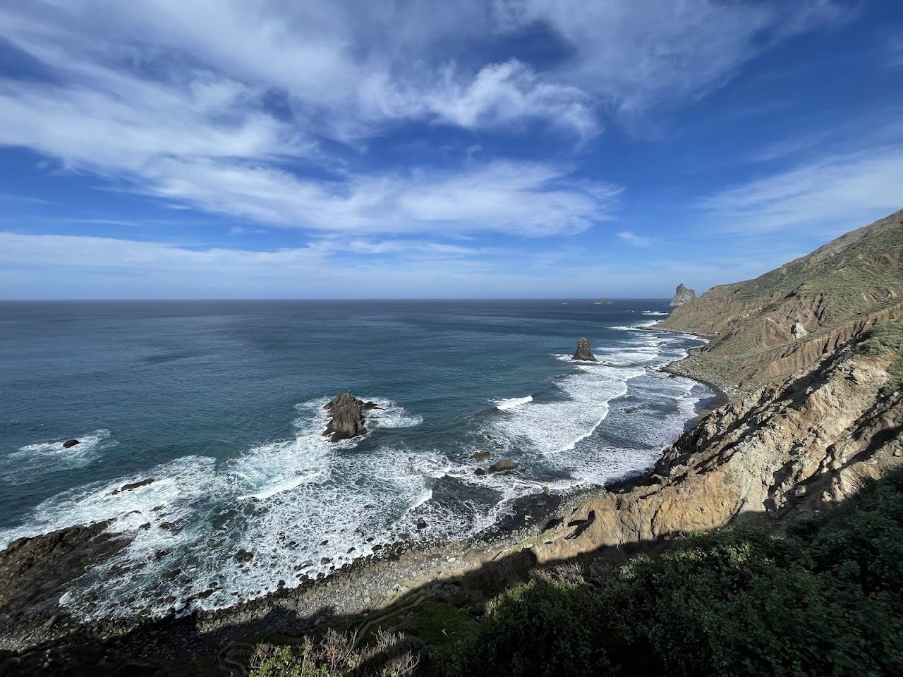 Wild black sand and sea stacks at a secluded beach in the Anaga mountains of Tenerife