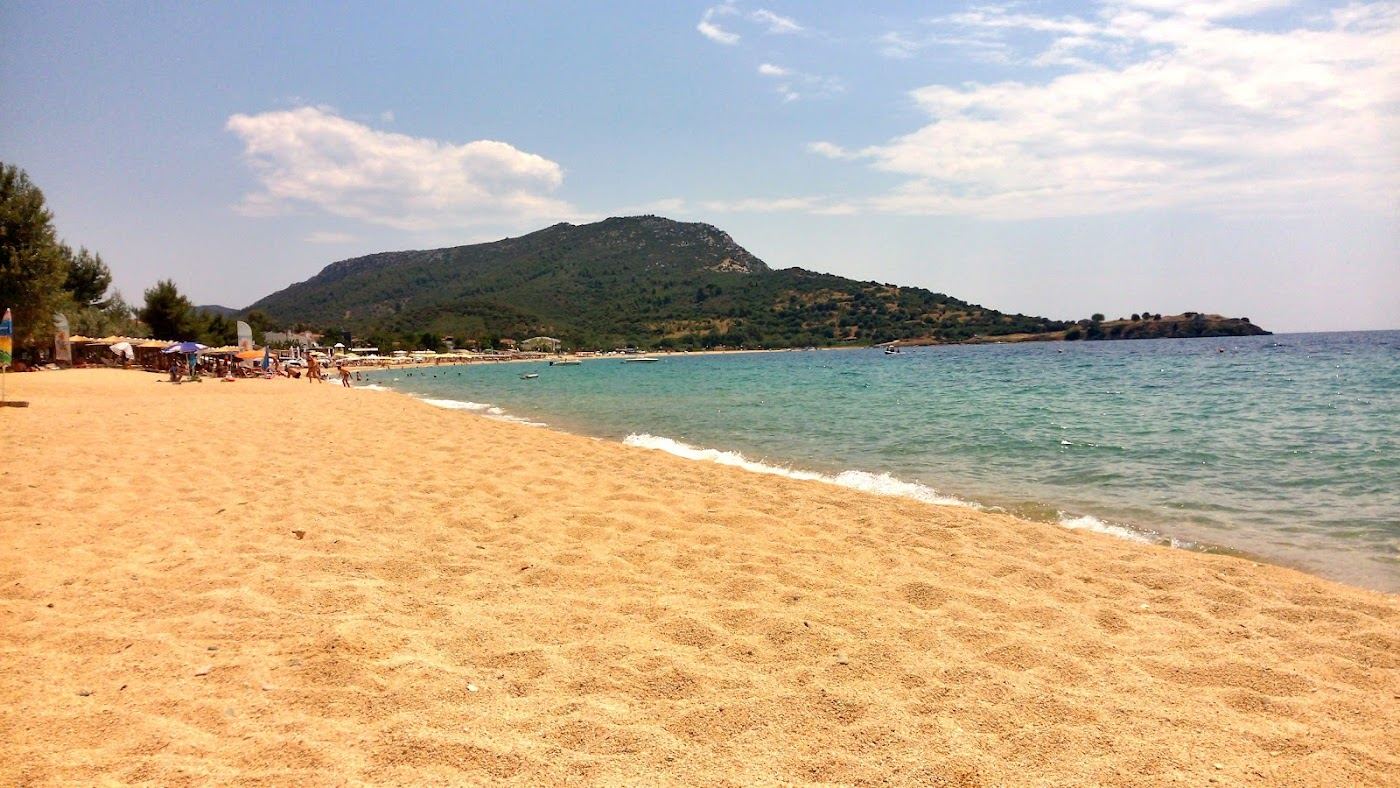 Clear blue water and the headland at the southern end of Toroni beach on Sithonia in Halkidiki