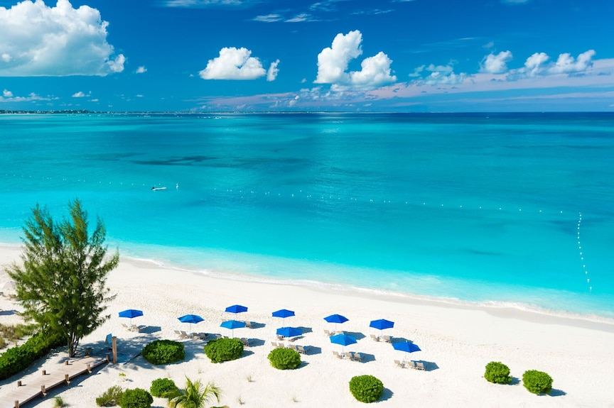 Brilliant turquoise shallows over white sand at Grace Bay in the Turks and Caicos