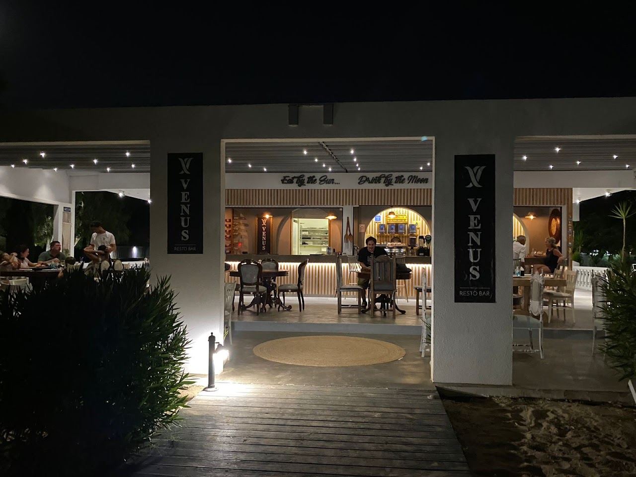 Loungers and bar at Venus Beach Bar on the sand at Tsilivi beach, Zakynthos