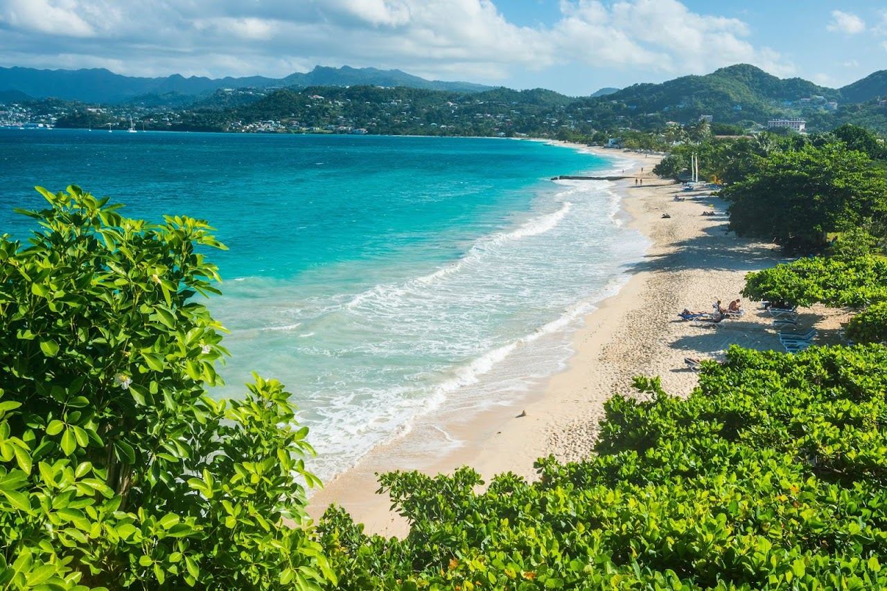 The long curve of Grand Anse beach on the spice island of Grenada